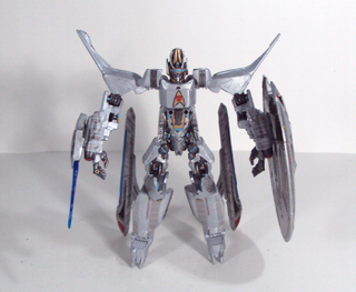 Illustration for article titled There's an Autobot hidden in this Custom Enterprise/Transformers toy